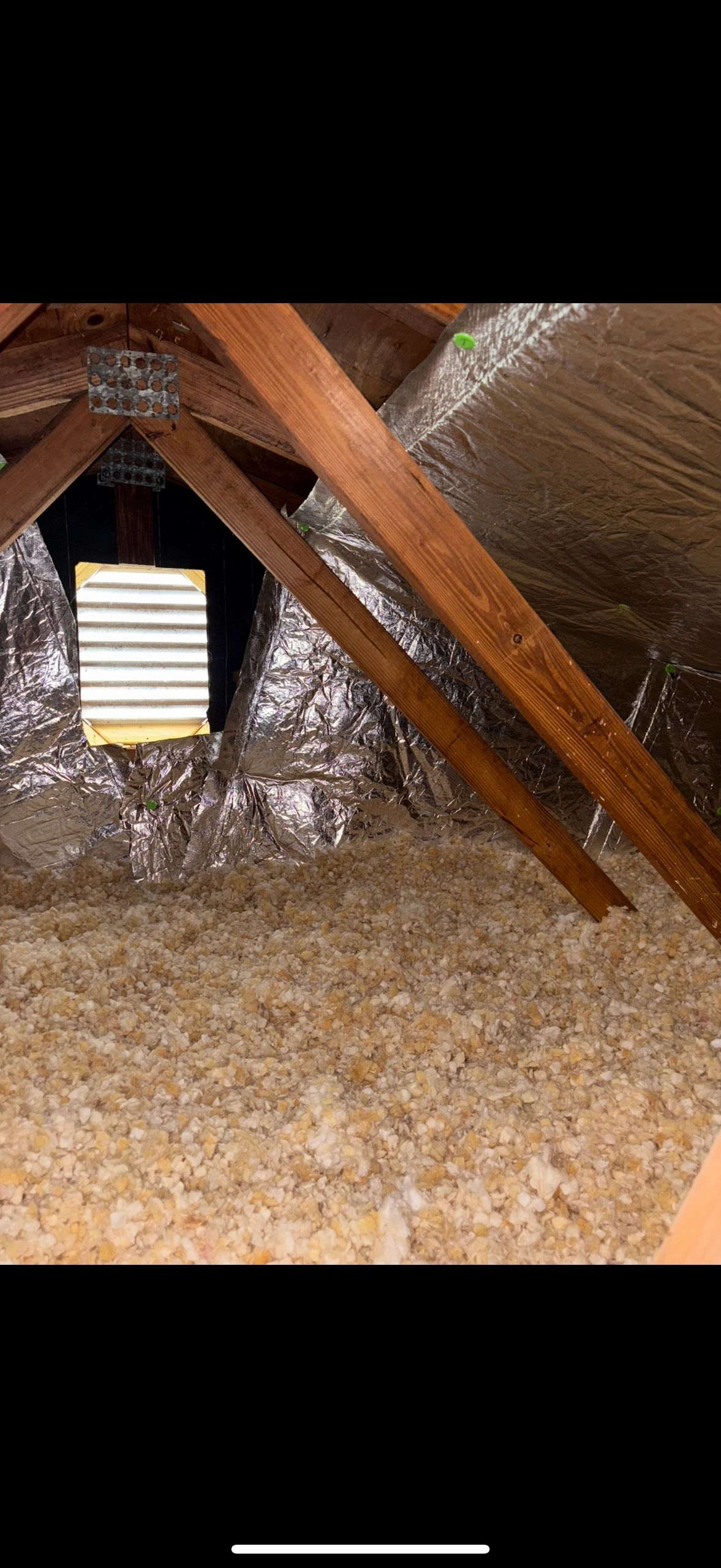 Reflective insulation attic roof joists